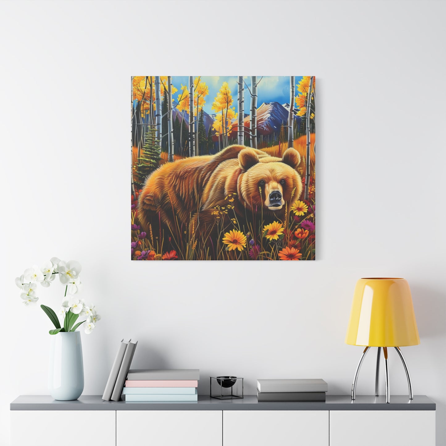 Brown Bear in Mountains smelling flowers